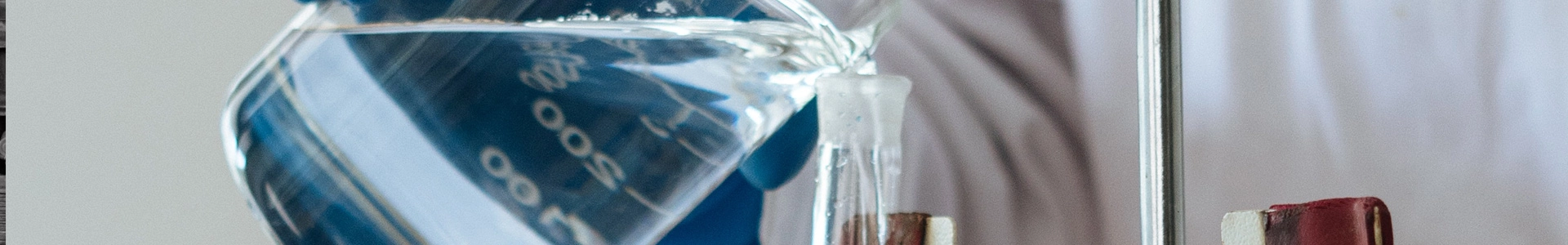 Ethanol being poured in a lab